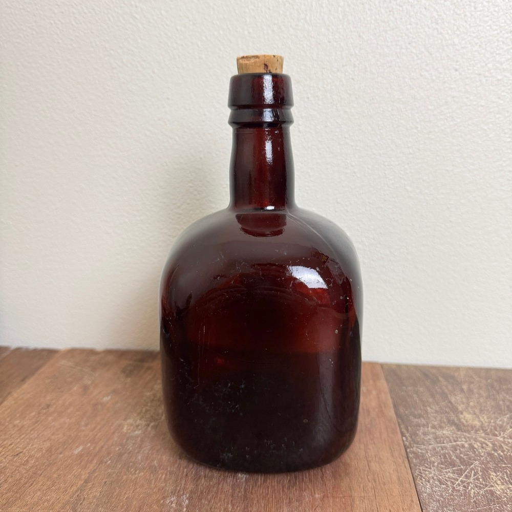 Antique square amber‎ bottle cork top Reg No 4734 on bottom